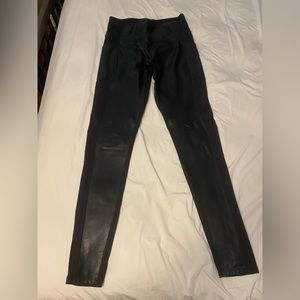 Beautiful leggings with leather material on the front. Good condition.